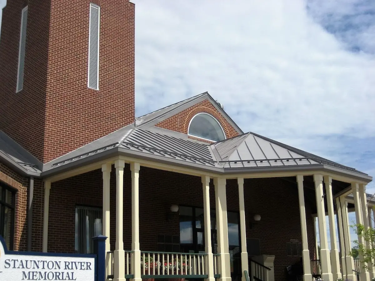 Skilled roofing craftsmen working on a residential roof in Gillette